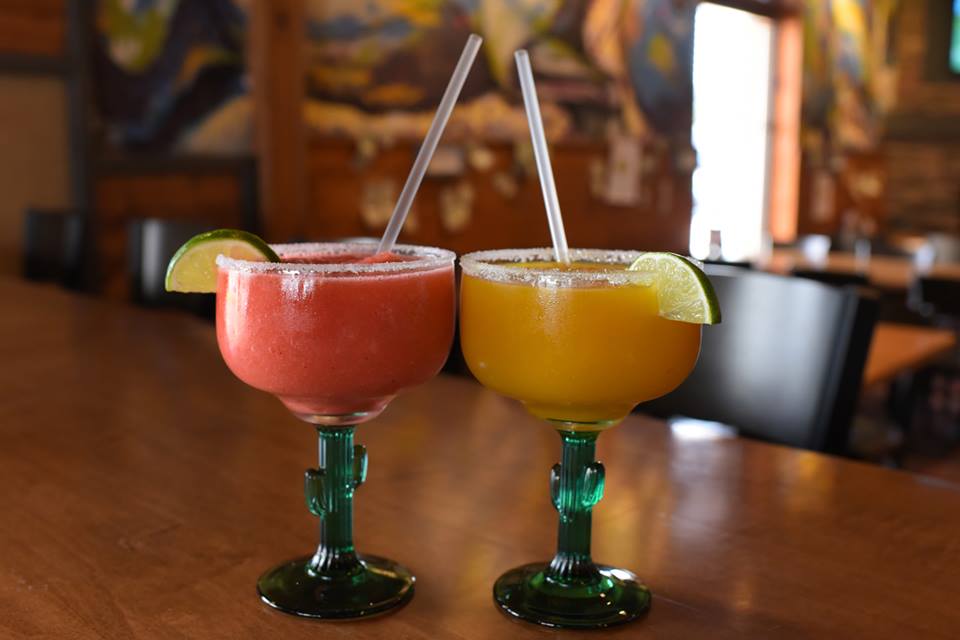 A vibrant array of signature cocktails from Crazy Horse Restaurant, perfect for toasting to a memorable dining experience in Monterey.
